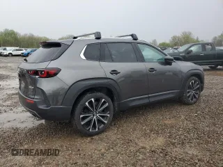 2023 Mazda CX-50 S Premium Plus z VIN 7MMVABEM0PN130397, wystawiony jako Copart lot #55559025 z przebiegiem 18 579 mil mil oraz Szkoda całkowita • Salvage title. Historia ofert i sprzedaży dostępna na DreamBid. Obrazek 3.