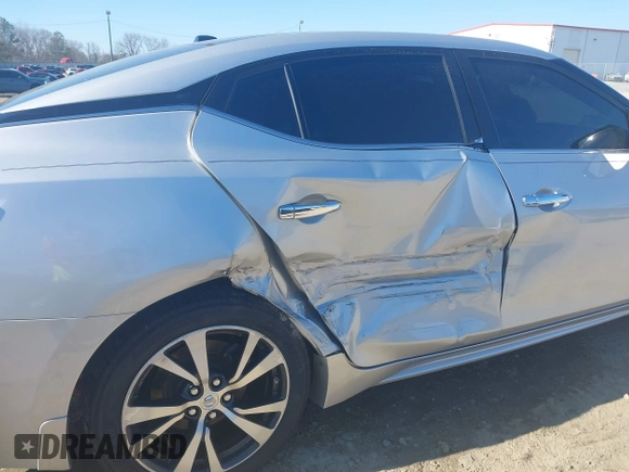 2016 Nissan Maxima SL with VIN 1N4AA6AP6GC448161, listed as a IAAI auction lot 41709077 with 133,288 mi miles and . Bid and sale history available at DreamBid. Image 6.