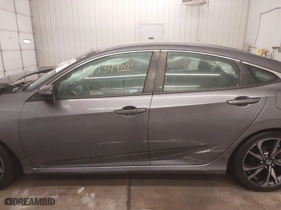 2019 Honda Civic Sedan Sport with VIN 2HGFC2F88KH556681, listed as a IAAI auction lot 41585019 with 92,349 mi miles. Bid and sale history available at carsss.com. Image 14.
