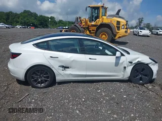 2023 Tesla Model 3 z VIN 5YJ3E1EA2PF626392, wystawiony jako IAAI lot #42288413 z przebiegiem 25 605 mil mil oraz . Historia ofert i sprzedaży dostępna na DreamBid. Obrazek 13.