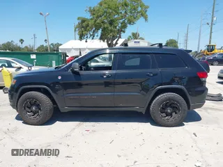 2017 Jeep Grand Cherokee Trailhawk with VIN 1C4RJFLG3HC836072, listed as a IAAI auction lot 42073775 with 139,374 mi miles and . Bid and sale history available at DreamBid. Image 14.