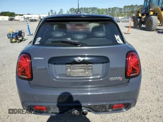 2020 MINI Hardtop 4 Door Cooper S z VIN WMWXU9C02L2M29164, wystawiony jako Copart lot #53538275 z przebiegiem 60 076 mil mil oraz Szkody całkowita. Historia ofert i sprzedaży dostępna na DreamBid. Obrazek 6.