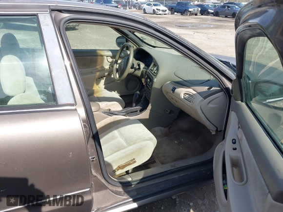 2002 Oldsmobile Alero GL1 z VIN 1G3NL52E82C172314, wystawiony jako IAAI lot #41465789 z przebiegiem 118 427 mil mil oraz . Historia ofert i sprzedaży dostępna na DreamBid. Obrazek 5.