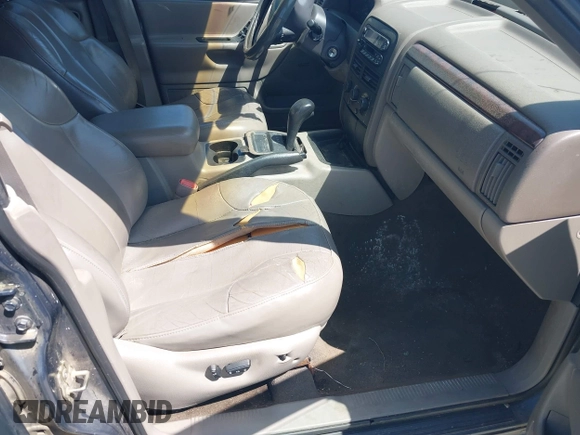 2000 Jeep Grand Cherokee Laredo with VIN 1J4G248S1YC416634, listed as a IAAI auction lot 42036197 with 140,596 mi miles and . Bid and sale history available at DreamBid. Image 5.