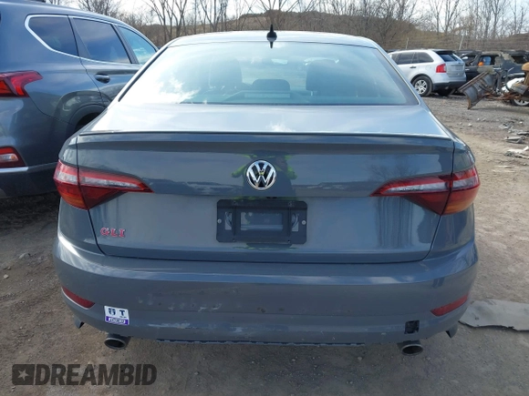 2019 Volkswagen Jetta GLI S z VIN 3VW6T7BU6KM209458, wystawiony jako IAAI lot #41334724 z przebiegiem 53 634 mil mil oraz . Historia ofert i sprzedaży dostępna na DreamBid. Obrazek 16.