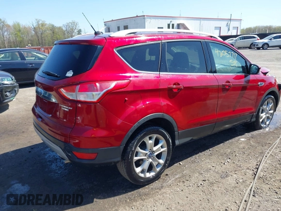 2015 Ford Escape Titanium with VIN 1FMCU9J90FUB00714, listed as a IAAI auction lot 42057717 with 61,223 mi miles. Bid and sale history available at carsss.com. Image 4.
