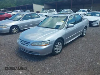 2002 Honda Accord EX z VIN 1HGCG56622A013090, wystawiony jako IAAI lot #42132291 z przebiegiem 152 567 mil mil oraz . Historia ofert i sprzedaży dostępna na DreamBid. Obrazek 2.