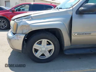 2003 Chevrolet TrailBlazer EXT LT with VIN 1GNES16S736233526, listed as a IAAI auction lot 42193747 with 197,471 mi miles. Bid and sale history available at carsss.com. Image 16.