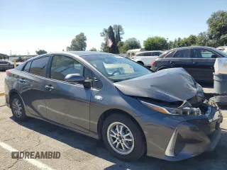 2021 Toyota Prius LE with VIN JTDKAMFP5M3177018, listed as a Copart auction lot 63930405 with 58,439 mi miles and Salvage title. Bid and sale history available at DreamBid. Image 4.