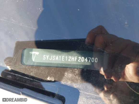 2017 Tesla Model S 60 with VIN 5YJSA1E12HF204700, listed as a IAAI auction lot 41539122 with NaN miles. Bid and sale history available at carsss.com. Image 9.