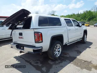 2018 GMC Sierra 1500 SLT z VIN 3GTU2NEC9JG240754, wystawiony jako IAAI lot #41890229 z przebiegiem 183 966 mil mil oraz . Historia ofert i sprzedaży dostępna na DreamBid. Obrazek 4.