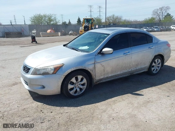 2009 Honda Accord Sdn EX-L with VIN 1HGCP36849A009901, listed as a IAAI auction lot 42057198 with 130,306 mi miles. Bid and sale history available at carsss.com. Image 2.