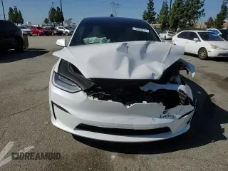 2023 Tesla Model X with VIN 7SAXCDE52PF378496, listed as a Copart auction lot 49455825 with Not Provided miles and Salvage Title. Bid and sale history available at DreamBid. Image 12.