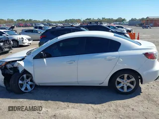 2011 Mazda 3 i Sport with VIN JM1BL1UFXB1434590, listed as a IAAI auction lot 41769754 with 144,046 mi miles and . Bid and sale history available at DreamBid. Image 14.
