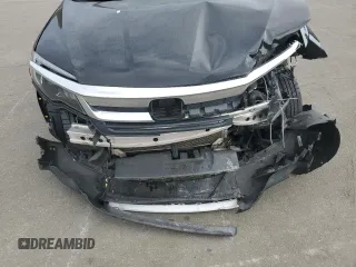 2021 Honda Pilot EX-L z VIN 5FNYF6H57MB031712, wystawiony jako Copart lot #77119974 z przebiegiem 140 118 mil mil oraz Nie do naprawy • Non repairable. Historia ofert i sprzedaży dostępna na DreamBid. Obrazek 12.