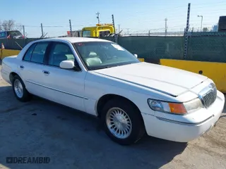 1999 Mercury Grand Marquis LS with VIN 2MEFM75W5XX633558, listed as a IAAI auction lot 41749114 with 224,484 mi miles. Bid and sale history available at carsss.com. Image 1.