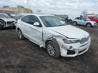 2017 BMW X4 xDrive28i with VIN 5UXXW3C57H0T77683, listed as a IAAI auction lot 41388090 with 80,015 mi miles and . Bid and sale history available at DreamBid. Image 1.