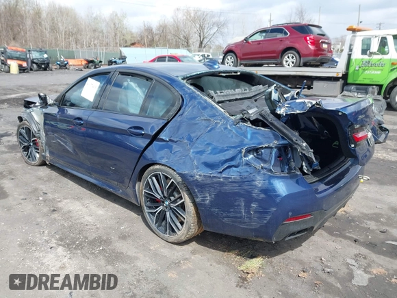 2022 BMW 5 Series M550i xDrive with VIN WBA13BK08NCJ54124, listed as a IAAI auction lot 41977413 with Not provided miles and . Bid and sale history available at DreamBid. Image 3.