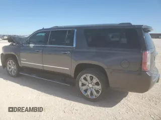2015 GMC Yukon XL Denali with VIN 1GKS2JKJ3FR743050, listed as a Copart auction lot 50174675 with 143,154 mi miles and Salvage Title. Bid and sale history available at carsss.com. Image 2.