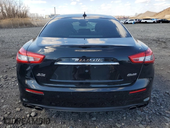 2019 Maserati Ghibli S Q4 z VIN ZAM57YTA8K1328392, wystawiony jako Copart lot #50711685 z przebiegiem 56 609 mil mil oraz Szkoda całkowita • Salvage title. Historia ofert i sprzedaży dostępna na DreamBid. Obrazek 6.