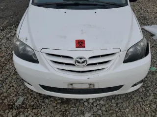 2005 Mazda MPV LX z VIN JM3LW28J450534573, wystawiony jako Copart lot #86167564 z przebiegiem 196 056 mil mil oraz Szkoda całkowita • Salvage title. Historia ofert i sprzedaży dostępna na DreamBid. Obrazek 13.