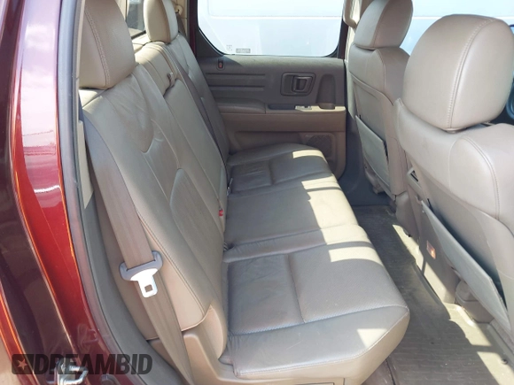 2007 Honda Ridgeline RTL with VIN 2HJYK16587H518901, listed as a IAAI auction lot 42762425 with 206,243 mi miles and . Bid and sale history available at DreamBid. Image 8.