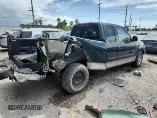 2001 Ford F-150 XL with VIN 1FTRX17L51NA83857, listed as a Copart auction lot 62759145 with 215,961 mi miles and Salvage title. Bid and sale history available at DreamBid. Image 3.