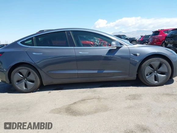 2019 Tesla Model 3 Long Range with VIN 5YJ3E1EB9KF386047, listed as a IAAI auction lot 42215362 with 41,246 mi miles and . Bid and sale history available at DreamBid. Image 14.