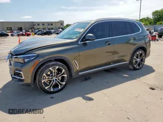 2023 BMW X5 xDrive40i with VIN 5UXCR6C01P9P27041, listed as a Copart auction lot 59009585 with 45,568 mi miles and Salvage title. Bid and sale history available at DreamBid. Image 1.