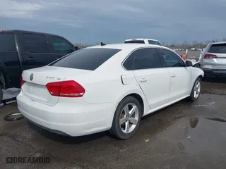 2013 Volkswagen Passat SE with VIN 1VWBP7A39DC070202, listed as a IAAI auction lot 41555860 with 149,091 mi miles. Bid and sale history available at carsss.com. Image 4.