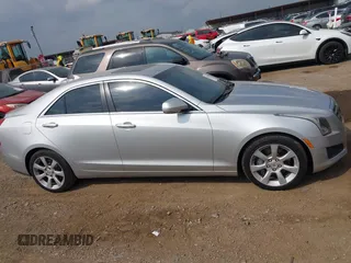 2014 Cadillac ATS Luxury RWD with VIN 1G6AB5RX7E0143954, listed as a IAAI auction lot 42156629 with 79,619 mi miles and . Bid and sale history available at DreamBid. Image 13.