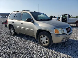 2003 GMC Envoy SLT z VIN 1GKDS13S032373020, wystawiony jako Copart lot #54986765 z przebiegiem 235 711 mil mil oraz Tytuł czysty. Historia ofert i sprzedaży dostępna na DreamBid. Obrazek 4.