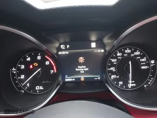 2021 Alfa Romeo Stelvio Ti with VIN ZASPAKBN0M7D02795, listed as a IAAI auction lot 41052309 with 83,584 mi miles. Bid and sale history available at carsss.com. Image 7.