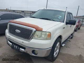 2007 Ford F-150 XLT with VIN 1FTPW12V97FA75590, listed as a IAAI auction lot 41916986 with 180,413 mi miles. Bid and sale history available at carsss.com. Image 2.