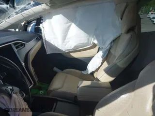 2016 Tesla Model X P90D with VIN 5YJXCAE4XGF000915, listed as a IAAI auction lot 41278587 with 98,728 mi miles. Bid and sale history available at carsss.com. Image 5.