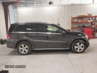2011 Mercedes-Benz GL-Class GL 450 with VIN 4JGBF7BE2BA737203, listed as a IAAI auction lot 41364607 with 133,921 mi miles. Bid and sale history available at carsss.com. Image 14.