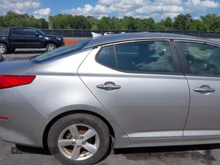 2015 Kia Optima LX with VIN 5XXGM4A79FG477619, listed as a IAAI auction lot 42561432 with 125,274 mi miles and . Bid and sale history available at DreamBid. Image 13.