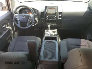 2015 Nissan Titan Pro-4X with VIN 1N6BA0EC5FN514184, listed as a Copart auction lot 56721065 with 127,283 mi miles and Salvage title. Bid and sale history available at DreamBid. Image 8.