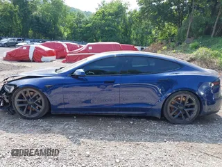 2022 Tesla Model S with VIN 5YJSA1E55NF486443, listed as a IAAI auction lot 42720110 with Not provided miles and . Bid and sale history available at DreamBid. Image 15.