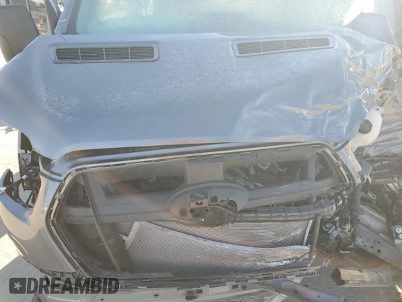 2024 Ford Transit Cargo with VIN 1FTBR1Y85RKA07509, listed as a Copart auction lot 42248405 with Not Provided miles and Salvage Title. Bid and sale history available at DreamBid. Image 14.