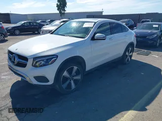 2018 Mercedes-Benz GLC with VIN WDC0J4KB3JF387946, listed as a IAAI auction lot 41494182 with 75,149 mi miles. Bid and sale history available at carsss.com. Image 2.