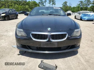 2009 BMW 6 Series 650i z VIN WBAEA535X9CV92734, wystawiony jako Copart lot #52678395 z przebiegiem 237 588 mil mil oraz Czysty tytuł • Clean title. Historia ofert i sprzedaży dostępna na DreamBid. Obrazek 5.