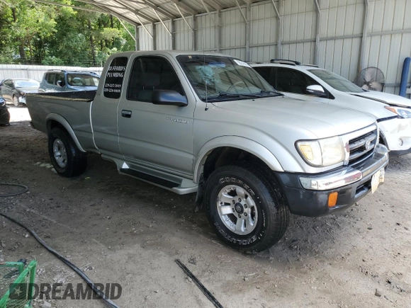 2000 Toyota Tacoma with VIN 4TAWN72N0YZ589681, listed as a Copart auction lot 55219145 with 204,946 mi miles and Salvage title. Bid and sale history available at DreamBid. Image 4.