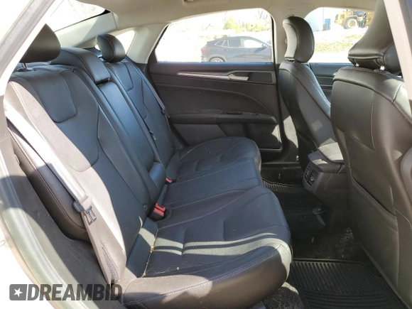 2016 Ford Fusion Titanium Hybrid with VIN 3FA6P0RU0GR153294, listed as a Copart auction lot 52723515 with 117,570 mi miles and Salvage title. Bid and sale history available at DreamBid. Image 10.