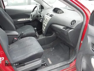 2008 Toyota Yaris with VIN JTDBT923981287730, listed as a IAAI auction lot 42141989 with 206,377 mi miles. Bid and sale history available at carsss.com. Image 5.