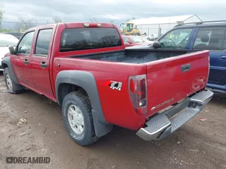 2005 Chevrolet Colorado 1SF LS Z71 with VIN 1GCDT136858133709, listed as a IAAI auction lot 42083101 with 209,919 mi miles. Bid and sale history available at carsss.com. Image 3.