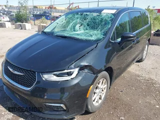2023 Chrysler Pacifica Touring L with VIN 2C4RC1BG9PR628170, listed as a IAAI auction lot 42515590 with 41,987 mi miles and . Bid and sale history available at DreamBid. Image 6.