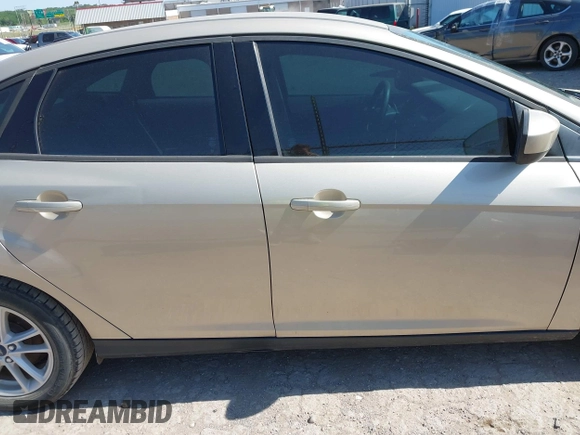 2018 Ford Focus SE z VIN 1FADP3FEXJL210905, wystawiony jako IAAI lot #42264105 z przebiegiem 136 499 mil mil oraz . Historia ofert i sprzedaży dostępna na DreamBid. Obrazek 13.
