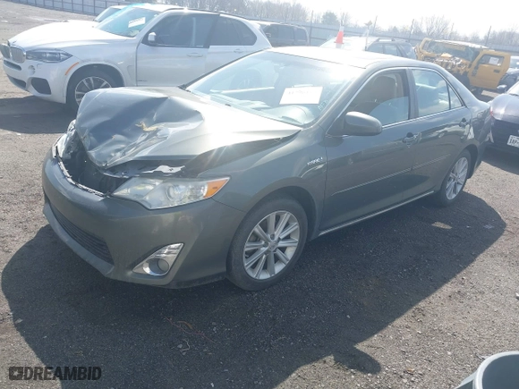 2014 Toyota Camry Hybrid LE with VIN 4T1BD1FK6EU129691, listed as a IAAI auction lot 41796112 with 264,392 mi miles. Bid and sale history available at carsss.com. Image 2.