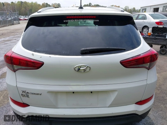 2017 Hyundai Tucson SE z VIN KM8J33A40HU383601, wystawiony jako IAAI lot #41947577 z przebiegiem 92 722 mil mil oraz . Historia ofert i sprzedaży dostępna na DreamBid. Obrazek 16.